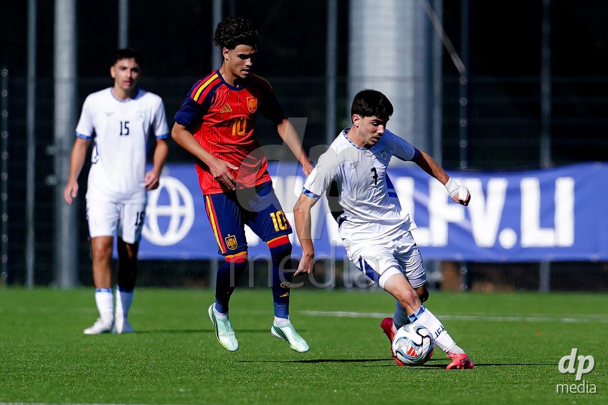 SCHAAN, LIECHTENSTEIN - OCTOBER 15: Yotam Kalfa of Israel and Aitor Torondel of Spain battle for the ball during the UEFA European Under-17 Qualifier match between Spain and Israel at LFV Campus Rheinwiese on October 15, 2026 in Schaan, Liechtenstein.