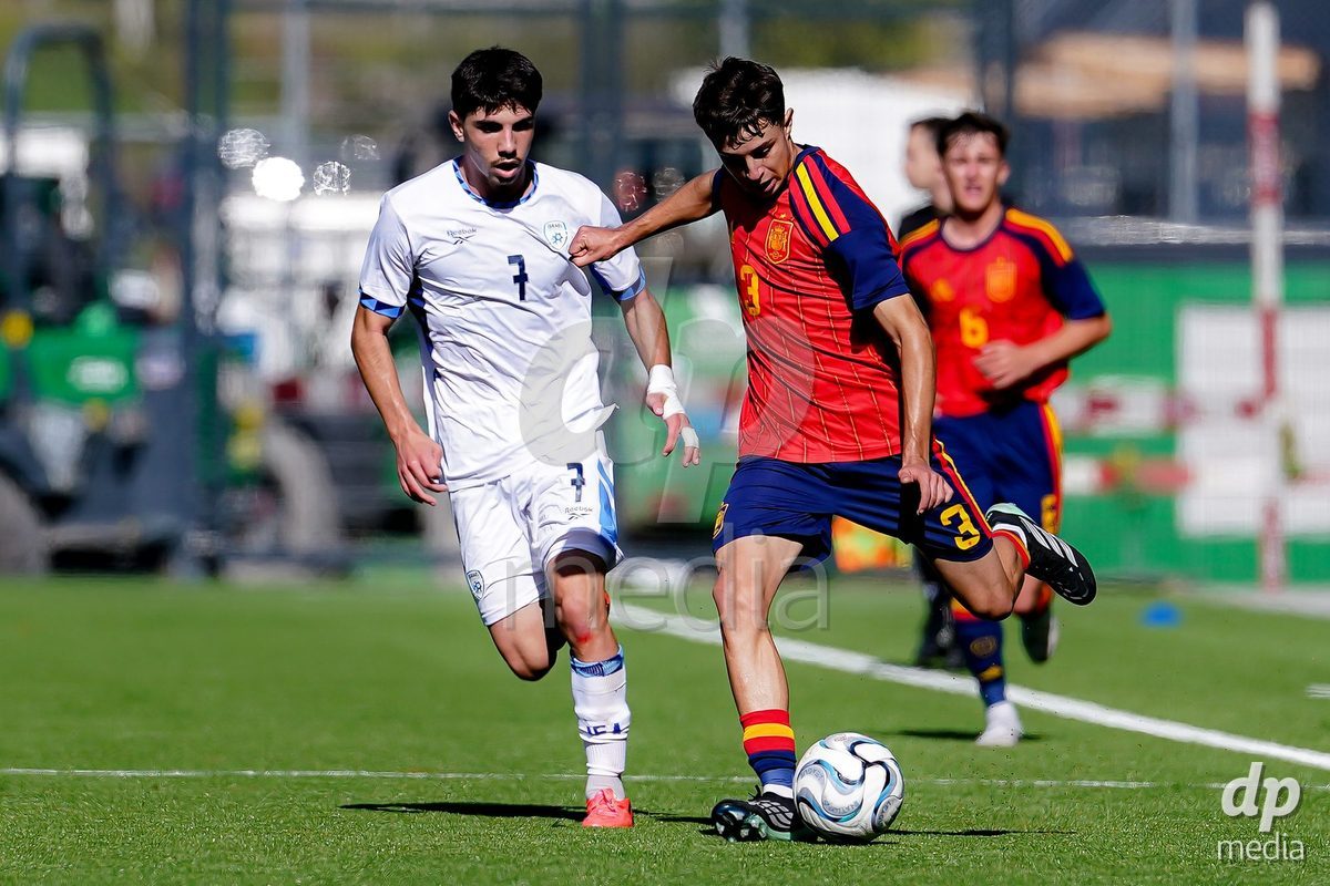 SCHAAN, LIECHTENSTEIN - OCTOBER 15: Marc Santos of Spain and Yotam Kalfa of Israel battle for the ball during the UEFA European Under-17 Qualifier match between Spain and Israel at LFV Campus Rheinwiese on October 15, 2026 in Schaan, Liechtenstein.