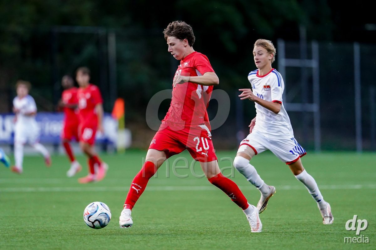 SCHAAN, LIECHTENSTEIN - OCTOBER 15: Loan Thommen of Switzerland controls the ball during the UEFA European Under-17 Qualifier match between Switzerland and Liechtenstein at LFV Campus Rheinwiese on October 15, 2026 in Schaan, Liechtenstein.