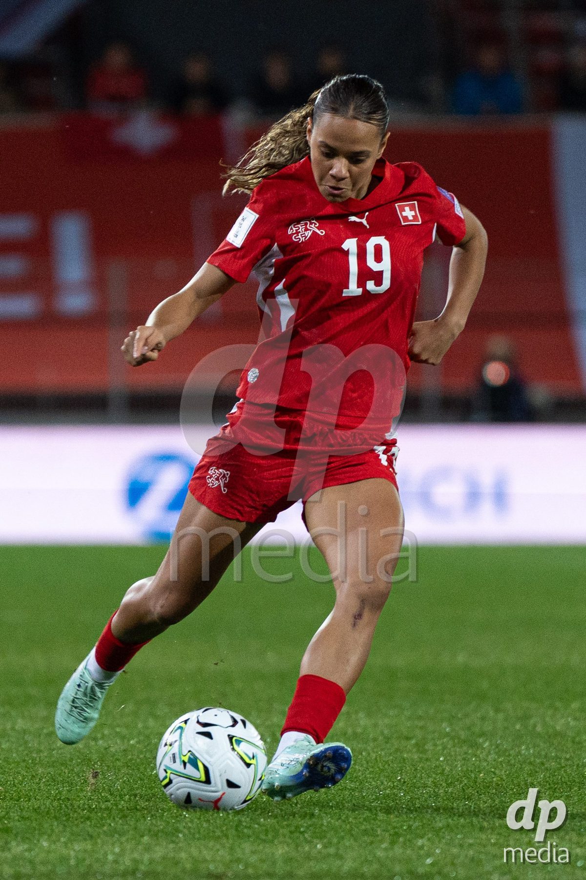 SION, SWITZERLAND, OCTOBER 13 : Iman Beney of Switzerland in action during the FIFA Women's World Cup 2027 Women's European Qualifiers Play-offs game between Switzerland and Israel at Stade de Tourbillon on October 13, 2026 in Sion, Switzerland.