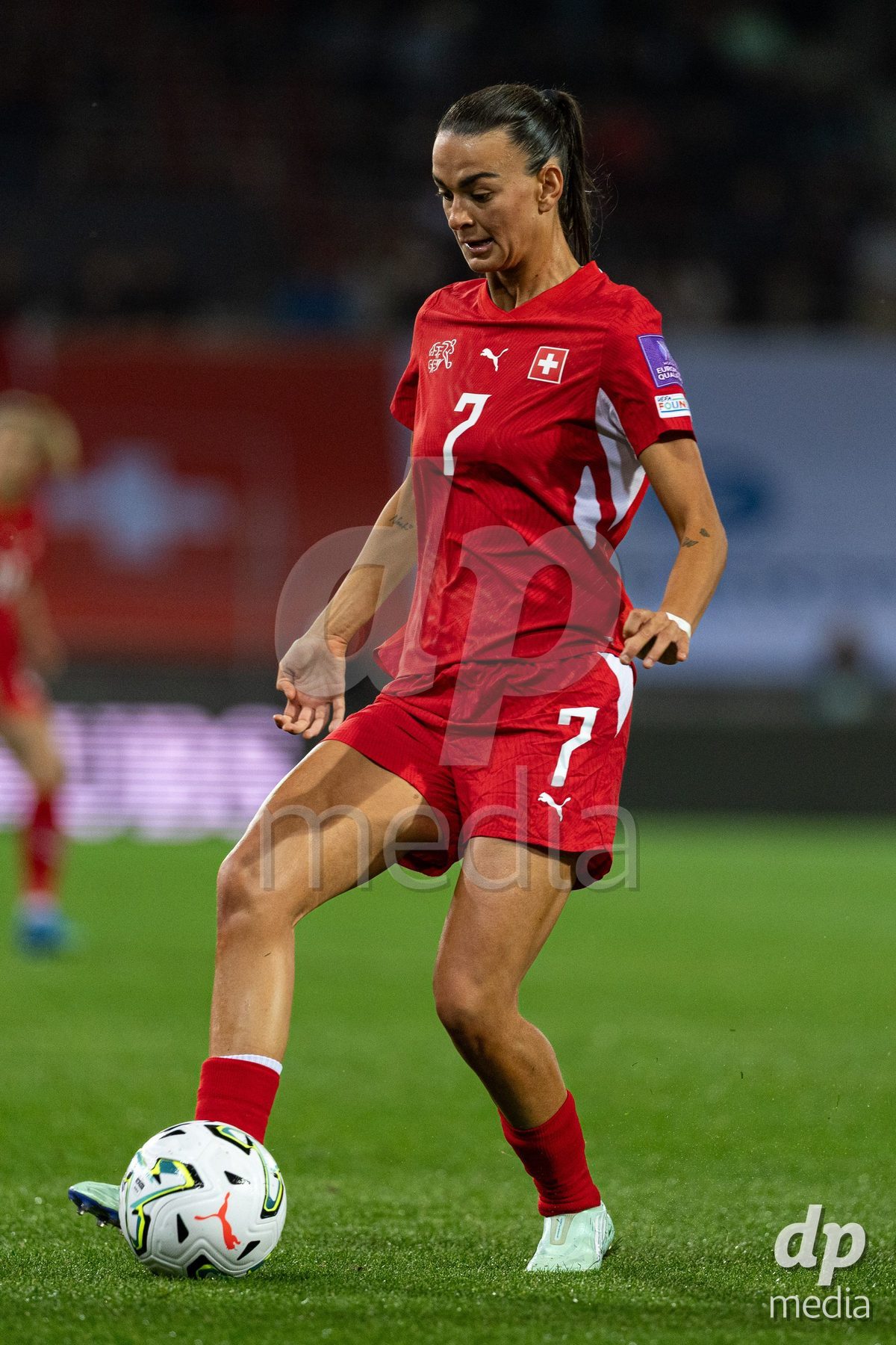 SION, SWITZERLAND, OCTOBER 13 : Riola Xhemaili of Switzerland passes the ball during the FIFA Women's World Cup 2027 Women's European Qualifiers Play-offs game between Switzerland and Israel at Stade de Tourbillon on October 13, 2026 in Sion, Switzerland.