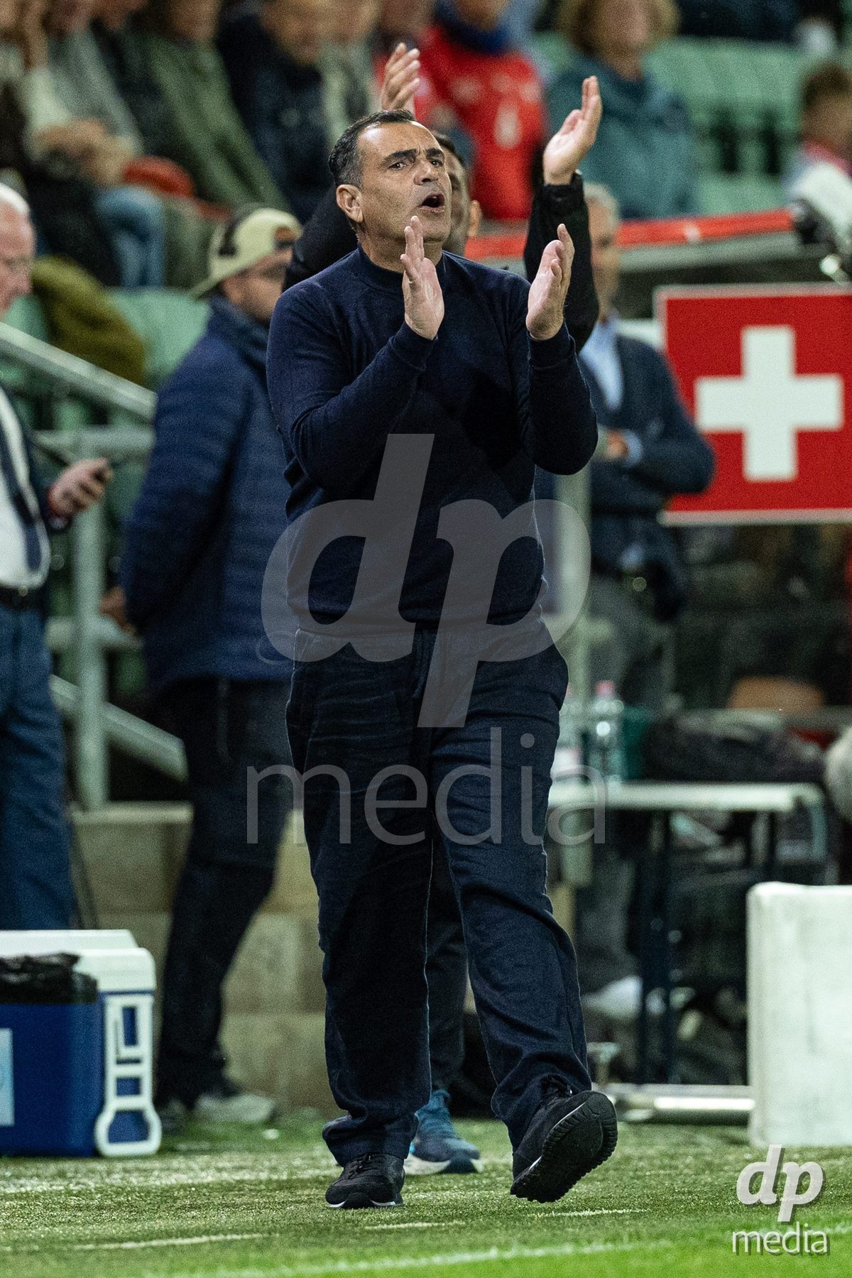 SION, SWITZERLAND, OCTOBER 13 : Menahem Koretzki, Israel's headcoach, in action during the FIFA Women's World Cup 2027 Women's European Qualifiers Play-offs game between Switzerland and Israel at Stade de Tourbillon on October 13, 2026 in Sion, Switzerland.