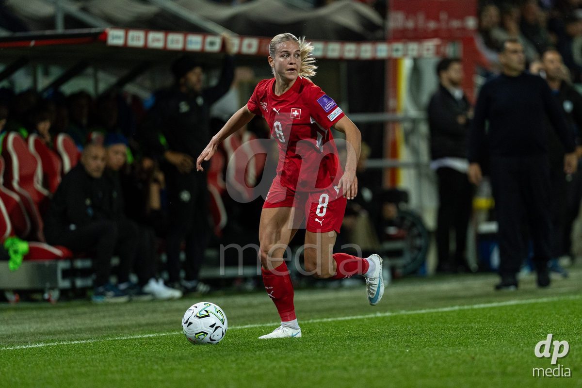 SION, SWITZERLAND, OCTOBER 13 : Nadine Riesen of Switzerland drives the ball during the FIFA Women's World Cup 2027 Women's European Qualifiers Play-offs game between Switzerland and Israel at Stade de Tourbillon on October 13, 2026 in Sion, Switzerland.