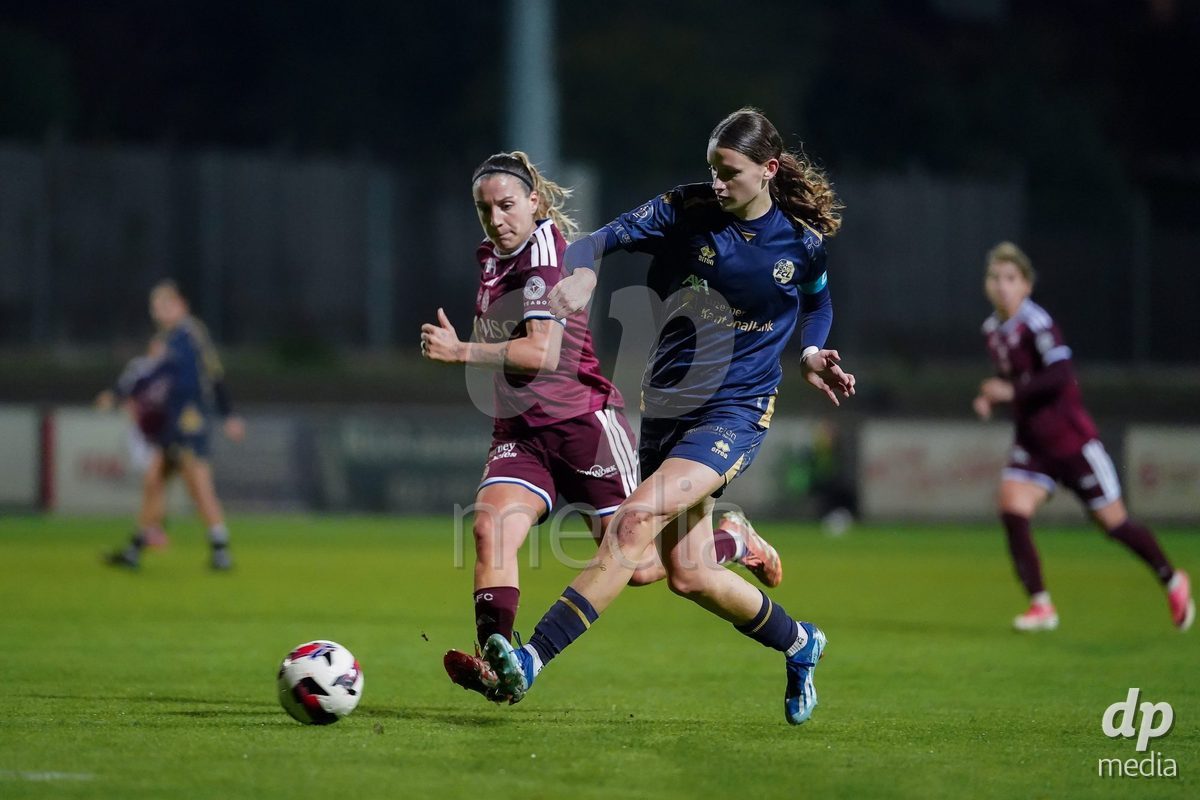 GENEVA, SWITZERLAND - OCTOBER 16: Gloria Marinelli of Servette FC Chenois Feminin and Lena Walti of FC Luzern battle for the ball during the AXA Women's Super League match between Servette FC Chenois Feminin and FC Luzern at Stade de Trois-Chene on October 16, 2026 in Geneva, Switzerland.