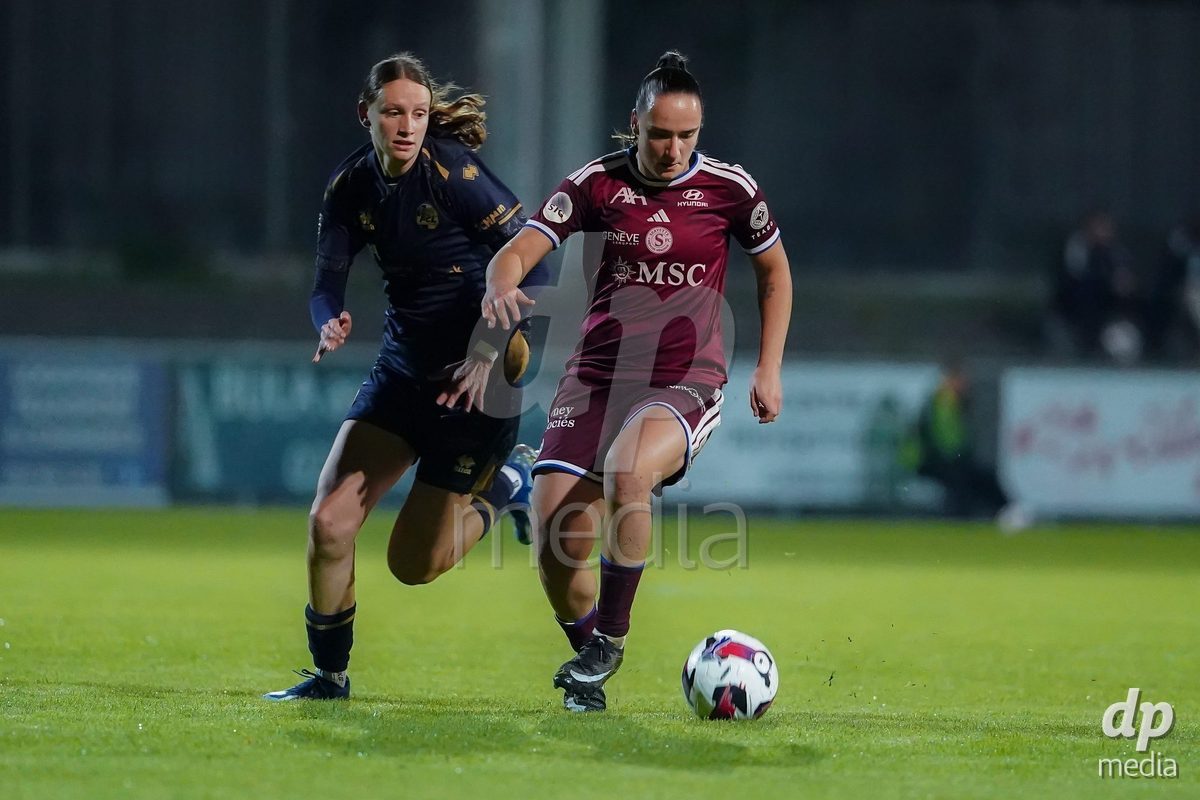 GENEVA, SWITZERLAND - OCTOBER 16: Magdalena Sobal of Servette FC Chenois Feminin and Lena Walti of FC Luzern battle for the ball during the AXA Women's Super League match between Servette FC Chenois Feminin and FC Luzern at Stade de Trois-Chene on October 16, 2026 in Geneva, Switzerland.