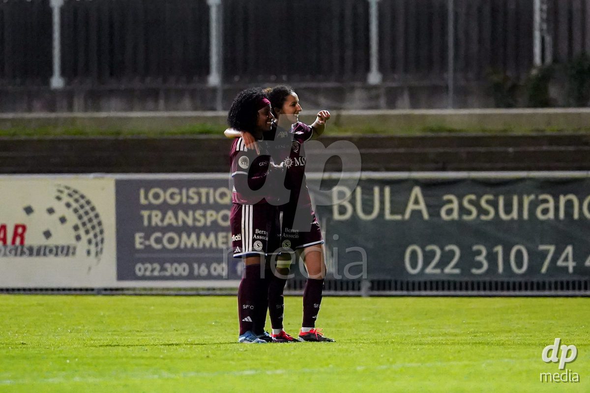 GENEVA, SWITZERLAND - OCTOBER 16: Mickaella Cardia of Servette FC Chenois Feminin celebrating with team after scoring teams second goal during the AXA Women's Super League match between Servette FC Chenois Feminin and FC Luzern at Stade de Trois-Chene on October 16, 2026 in Geneva, Switzerland.