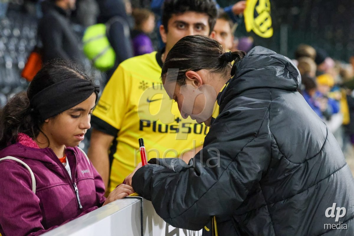 BERN, SWITZERLAND - OCTOBER 17: Players of YB Frauen with fans after their victory during the AXA Women's Super League match between BSC YB Frauen and GC Frauenfussball at Wankdorf Stadion on October 17, 2026 in Bern, Switzerland.