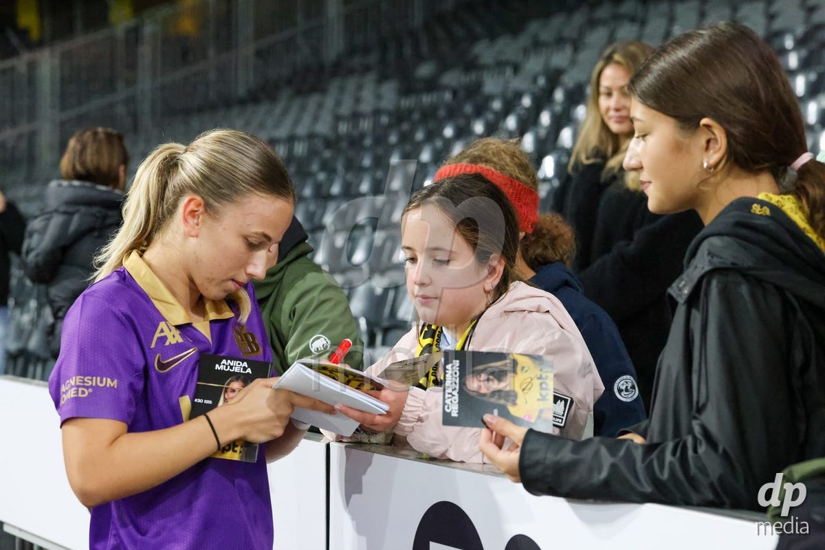 BERN, SWITZERLAND - OCTOBER 17: Players of YB Frauen with fans after their victory during the AXA Women's Super League match between BSC YB Frauen and GC Frauenfussball at Wankdorf Stadion on October 17, 2026 in Bern, Switzerland.