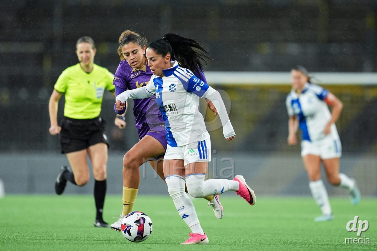 BERN, SWITZERLAND - OCTOBER 17: Stephanie Waeber of BSC YB Frauen (L) and Qendresa Krasniqi of GC Frauenfussball (R) battle for the ball (duel) during the AXA Women's Super League match between BSC YB Frauen and GC Frauenfussball at Wankdorf Stadion on October 17, 2026 in Bern, Switzerland.