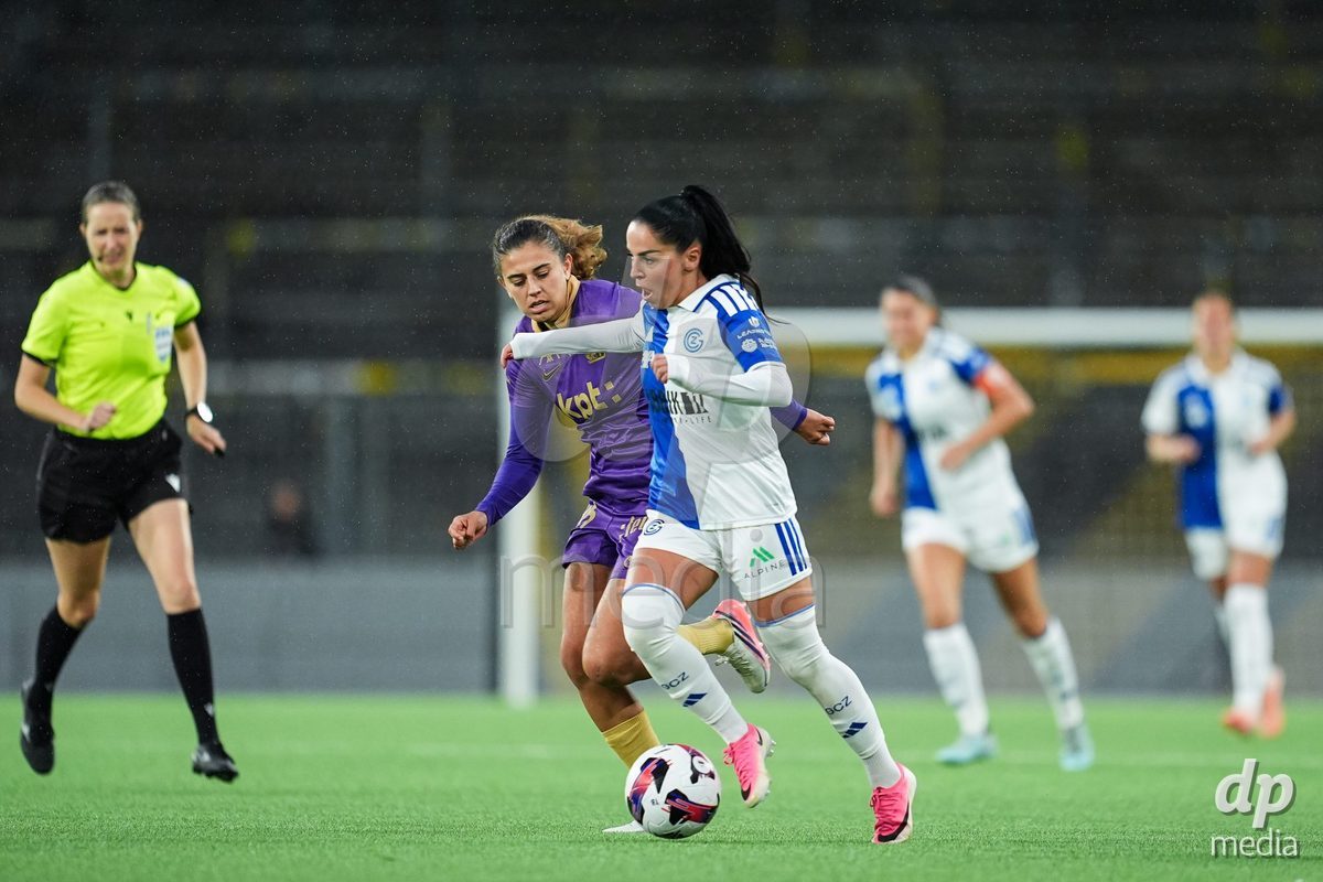 BERN, SWITZERLAND - OCTOBER 17: Stephanie Waeber of BSC YB Frauen (L) and Qendresa Krasniqi of GC Frauenfussball (R) battle for the ball (duel) during the AXA Women's Super League match between BSC YB Frauen and GC Frauenfussball at Wankdorf Stadion on October 17, 2026 in Bern, Switzerland.