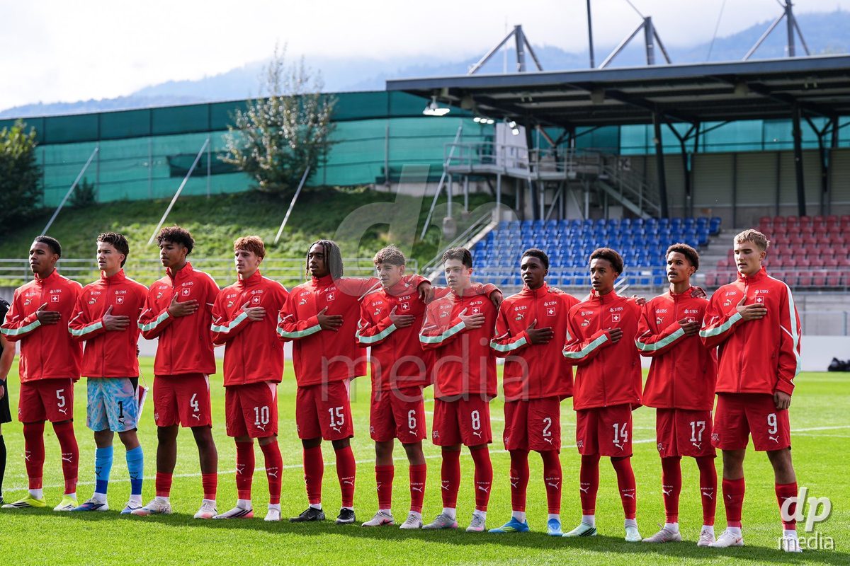 VADUZ, LIECHTENSTEIN - OCTOBER 18: Players of Switzerland during the national anthem prior to the UEFA European Under-17 Qualifier match between Switzerland and Spain at Rheinpark Stadion on October 18, 2026 in Vaduz, Liechtenstein.