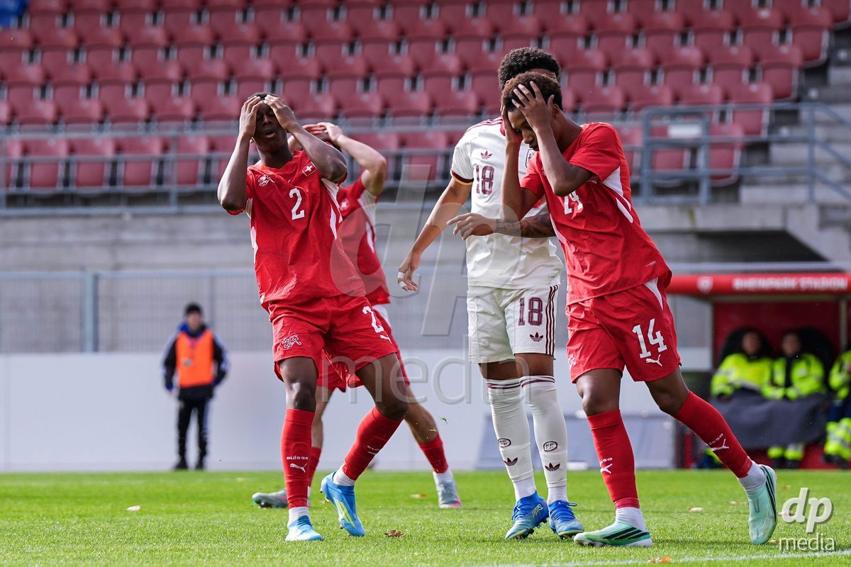 VADUZ, LIECHTENSTEIN - OCTOBER 18: Darren Okoh of Switzerland and Ryan Hare of Switzerland react during the UEFA European Under-17 Qualifier match between Switzerland and Spain at Rheinpark Stadion on October 18, 2026 in Vaduz, Liechtenstein.