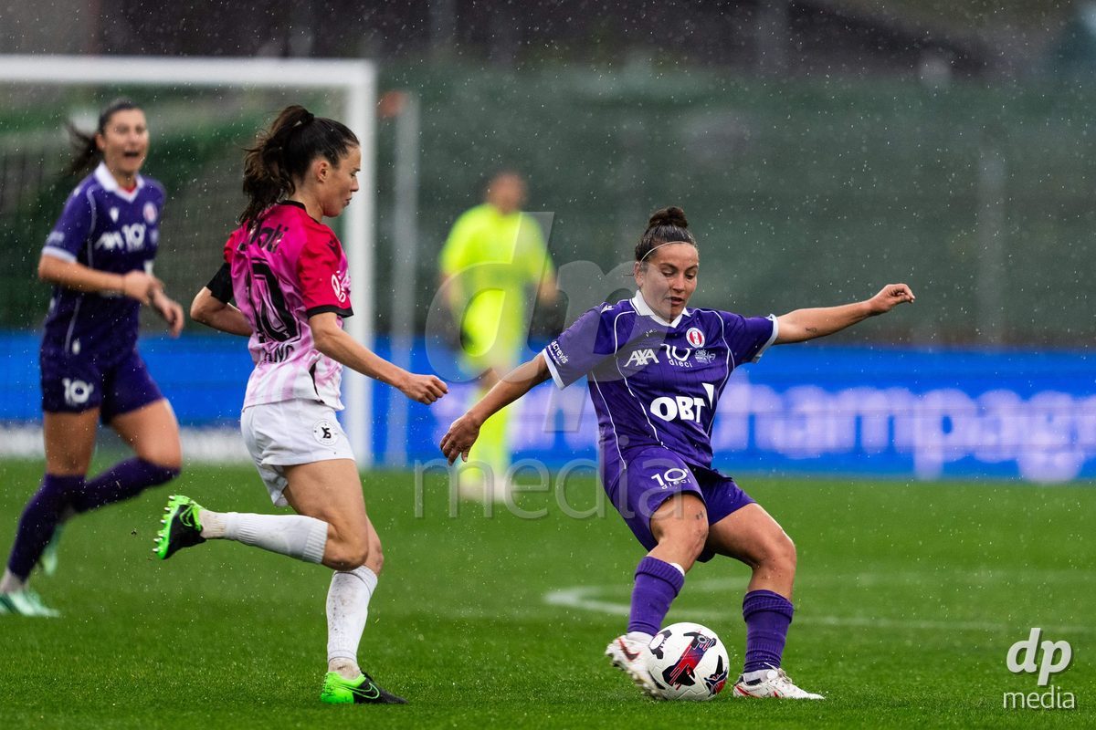 YVERDON-LES-BAINS, SWITZERLAND - OCTOBER 18: 13 Anna Bove Serra of FC Rapperswil-Jona and 10 Chloé Marie Anne Le Franc of Yverdon Sport Women challenging with the ball during the AXA Women's Super League match between FC Yverdon Women and FC Rapperswil-Jona at Stade Municipal on October 18, 2026 in Yverdon-les-Bains, Switzerland.