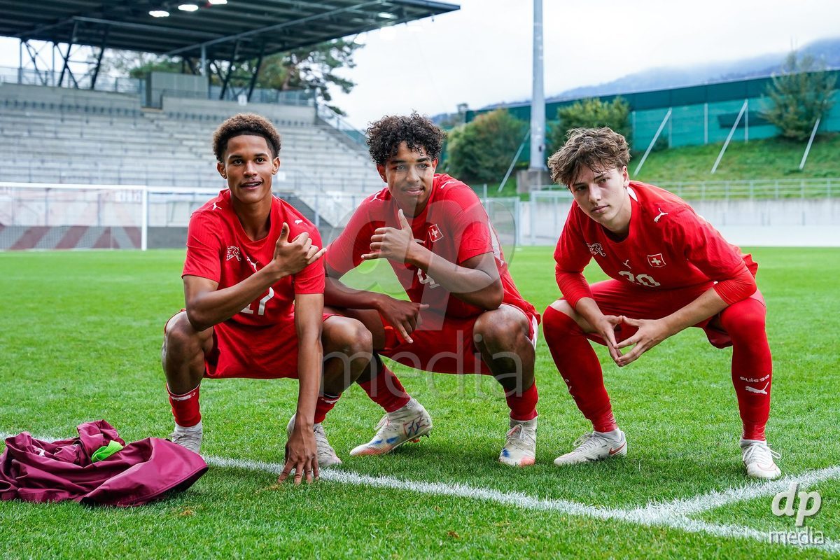 VADUZ, LIECHTENSTEIN - OCTOBER 18: Kyle Kurt, Ifeanyichukwu Onwuzulike and Loan Thommen of Switzerland celebrate during the UEFA European Under-17 Qualifier match between Switzerland and Spain at Rheinpark Stadion on October 18, 2026 in Vaduz, Liechtenstein.