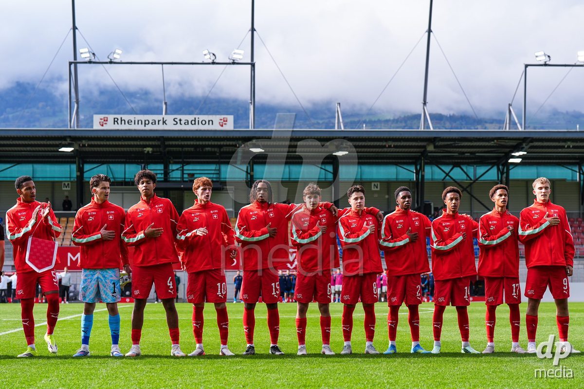 VADUZ, LIECHTENSTEIN - OCTOBER 18: Players of Switzerland during the national anthem prior to the UEFA European Under-17 Qualifier match between Switzerland and Spain at Rheinpark Stadion on October 18, 2026 in Vaduz, Liechtenstein.
