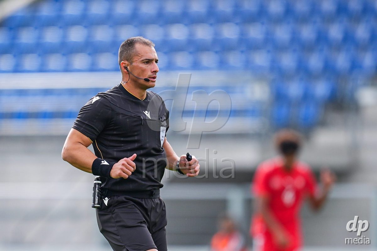 VADUZ, LIECHTENSTEIN - OCTOBER 18: Referee Konstantinos Fellas looks on during the UEFA European Under-17 Qualifier match between Switzerland and Spain at Rheinpark Stadion on October 18, 2026 in Vaduz, Liechtenstein.