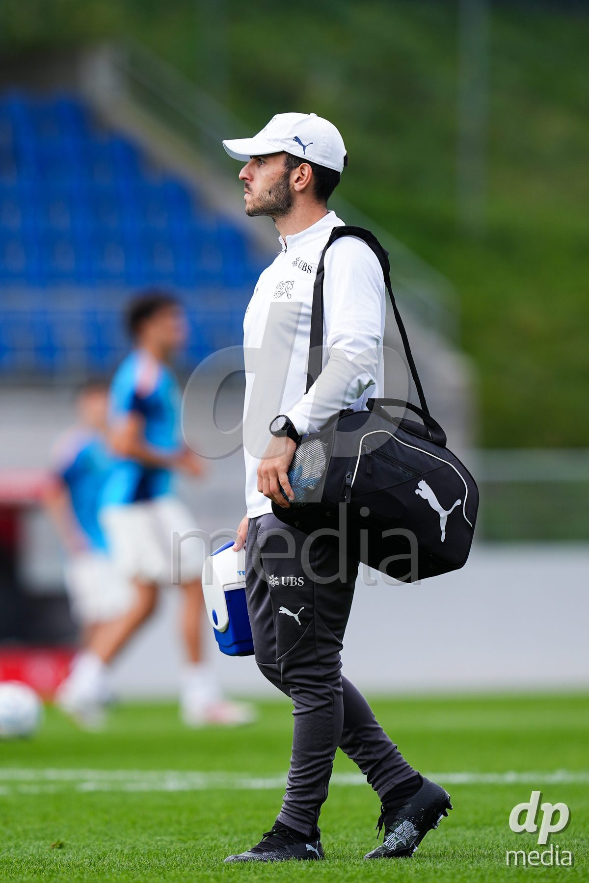 VADUZ, LIECHTENSTEIN - OCTOBER 18: Physiotherapist Luca Faillace of Switzerland during the UEFA European Under-17 Qualifier match between Switzerland and Spain at Rheinpark Stadion on October 18, 2026 in Vaduz, Liechtenstein.