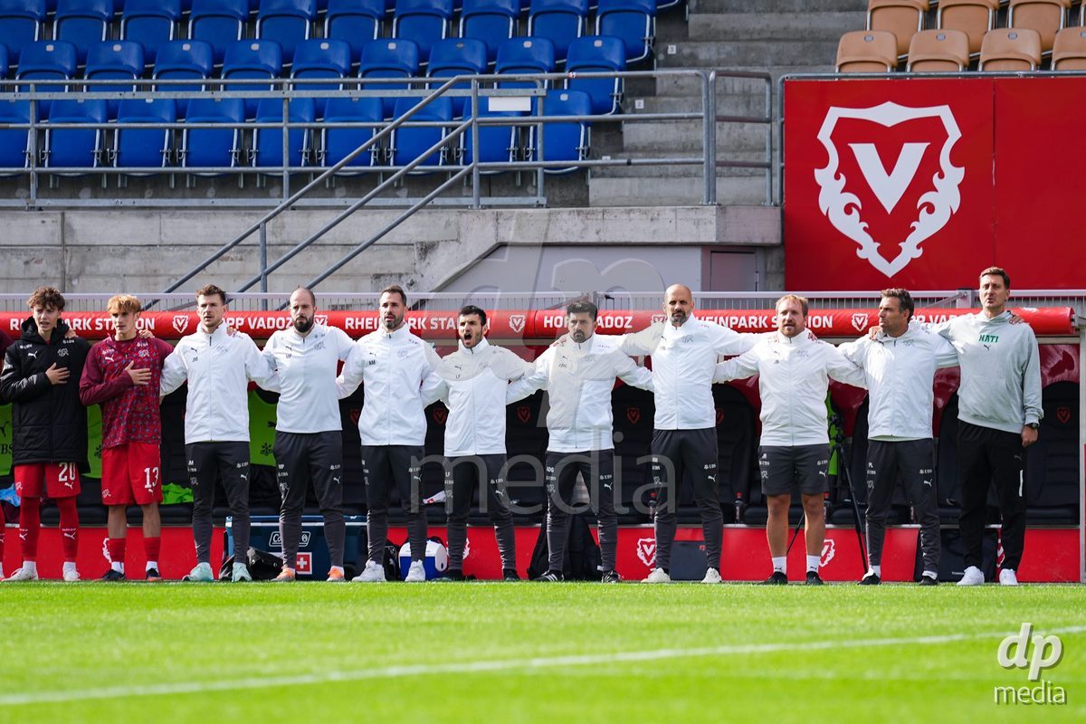 VADUZ, LIECHTENSTEIN - OCTOBER 18: Staff members of Switzerland during the national anthem prior to the UEFA European Under-17 Qualifier match between Switzerland and Spain at Rheinpark Stadion on October 18, 2026 in Vaduz, Liechtenstein.