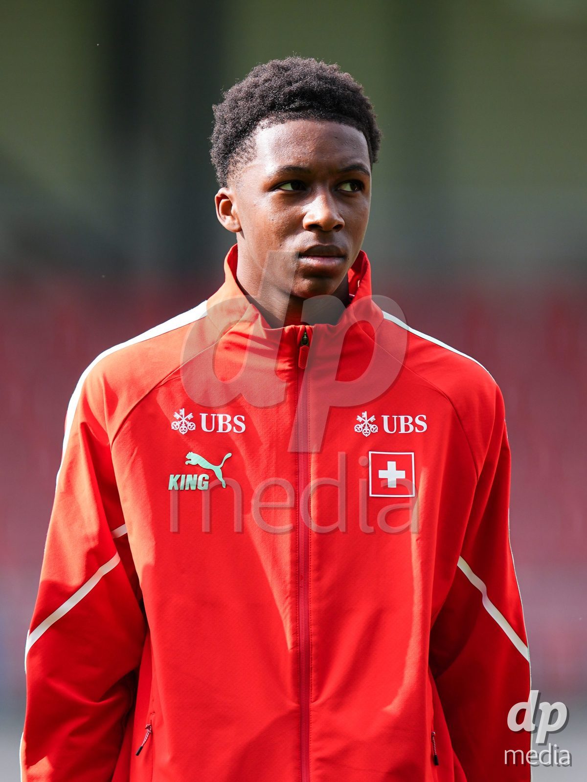 VADUZ, LIECHTENSTEIN - OCTOBER 18: Portrait (headshot/close up) of Darren Okoh of Switzerland during the national anthem prior to the UEFA European Under-17 Qualifier match between Switzerland and Spain at Rheinpark Stadion on October 18, 2026 in Vaduz, Liechtenstein.