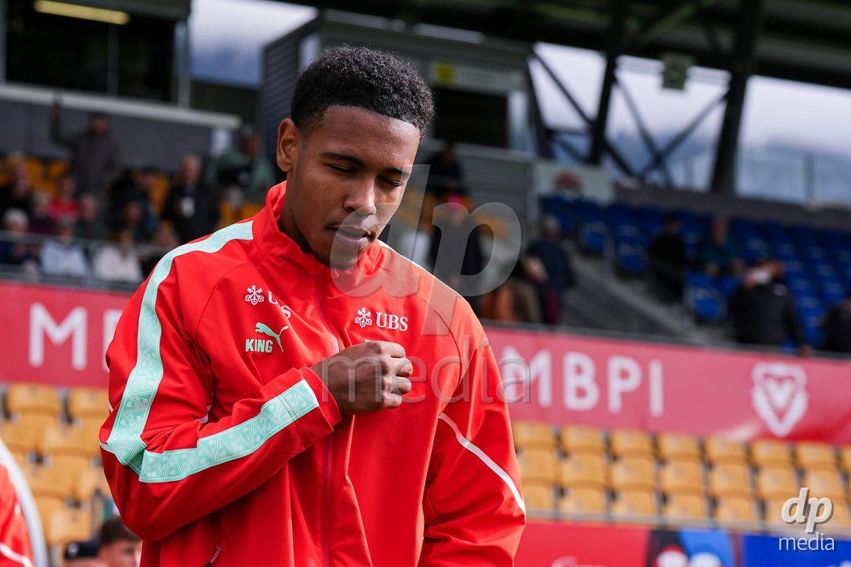 VADUZ, LIECHTENSTEIN - OCTOBER 18: Noah Kakor of Switzerland enters for the natioanl anthem prior to the UEFA European Under-17 Qualifier match between Switzerland and Spain at Rheinpark Stadion on October 18, 2026 in Vaduz, Liechtenstein.