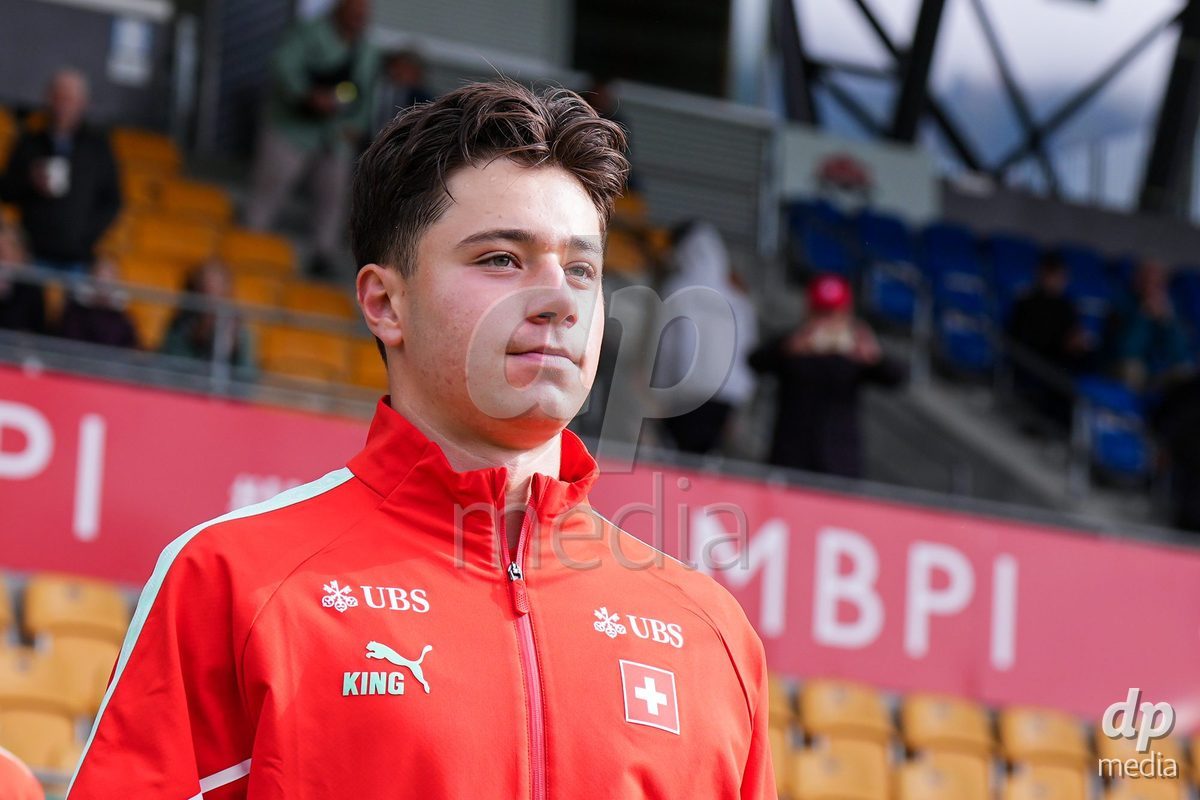 VADUZ, LIECHTENSTEIN - OCTOBER 18: Leandro Cottiati of Switzerland enters for the natioanl anthem prior to the UEFA European Under-17 Qualifier match between Switzerland and Spain at Rheinpark Stadion on October 18, 2026 in Vaduz, Liechtenstein.