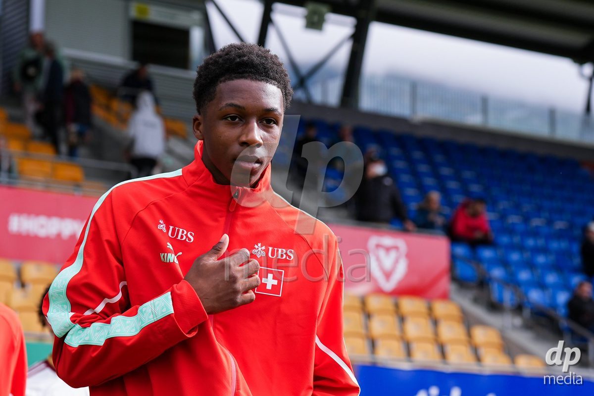 VADUZ, LIECHTENSTEIN - OCTOBER 18: Darren Okoh of Switzerland enters for the natioanl anthem prior to the UEFA European Under-17 Qualifier match between Switzerland and Spain at Rheinpark Stadion on October 18, 2026 in Vaduz, Liechtenstein.