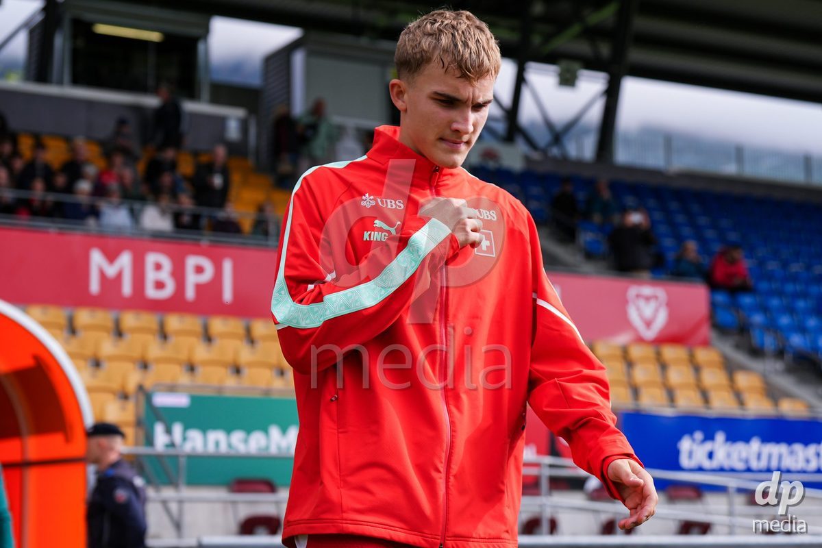VADUZ, LIECHTENSTEIN - OCTOBER 18: Niko Cavka of Switzerland enters for the natioanl anthem prior to the UEFA European Under-17 Qualifier match between Switzerland and Spain at Rheinpark Stadion on October 18, 2026 in Vaduz, Liechtenstein.
