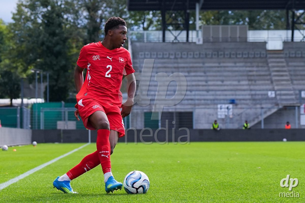 VADUZ, LIECHTENSTEIN - OCTOBER 18: Darren Okoh of Switzerland controls the ball during the UEFA European Under-17 Qualifier match between Switzerland and Spain at Rheinpark Stadion on October 18, 2026 in Vaduz, Liechtenstein.