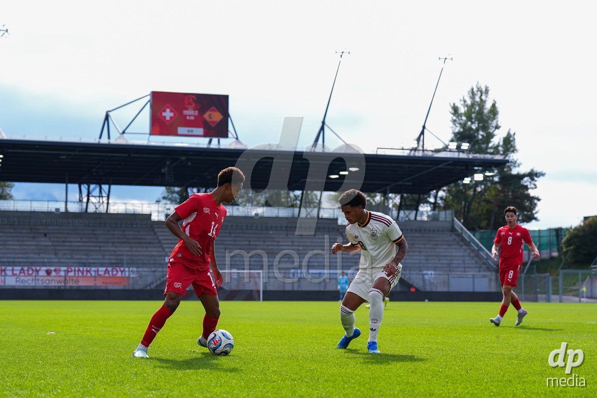 VADUZ, LIECHTENSTEIN - OCTOBER 18: Ryan Hare of Switzerland battles for the ball against Darek Barriento of Spain during the UEFA European Under-17 Qualifier match between Switzerland and Spain at Rheinpark Stadion on October 18, 2026 in Vaduz, Liechtenstein.