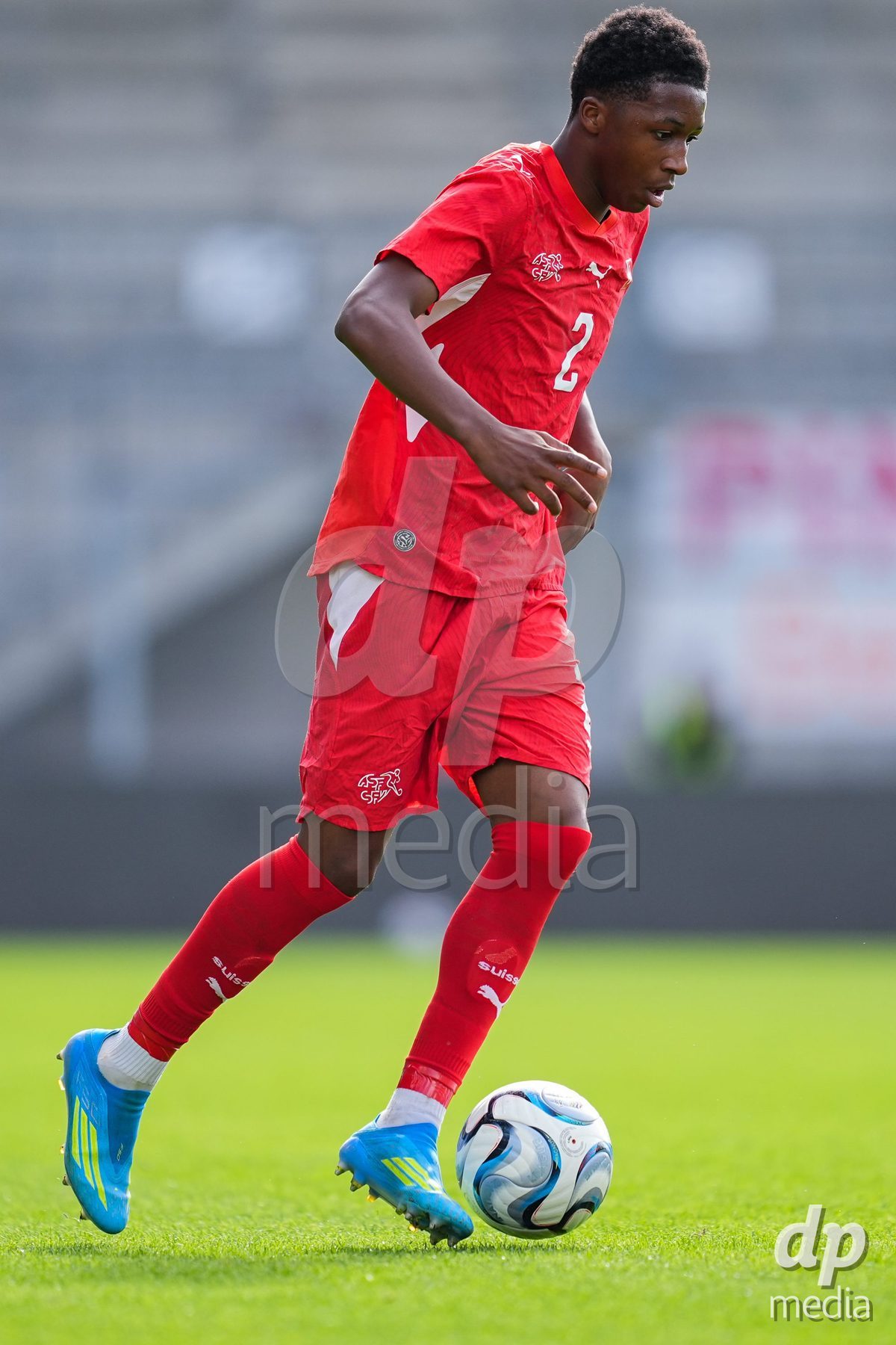 VADUZ, LIECHTENSTEIN - OCTOBER 18: Darren Okoh of Switzerland controls the ball during the UEFA European Under-17 Qualifier match between Switzerland and Spain at Rheinpark Stadion on October 18, 2026 in Vaduz, Liechtenstein.