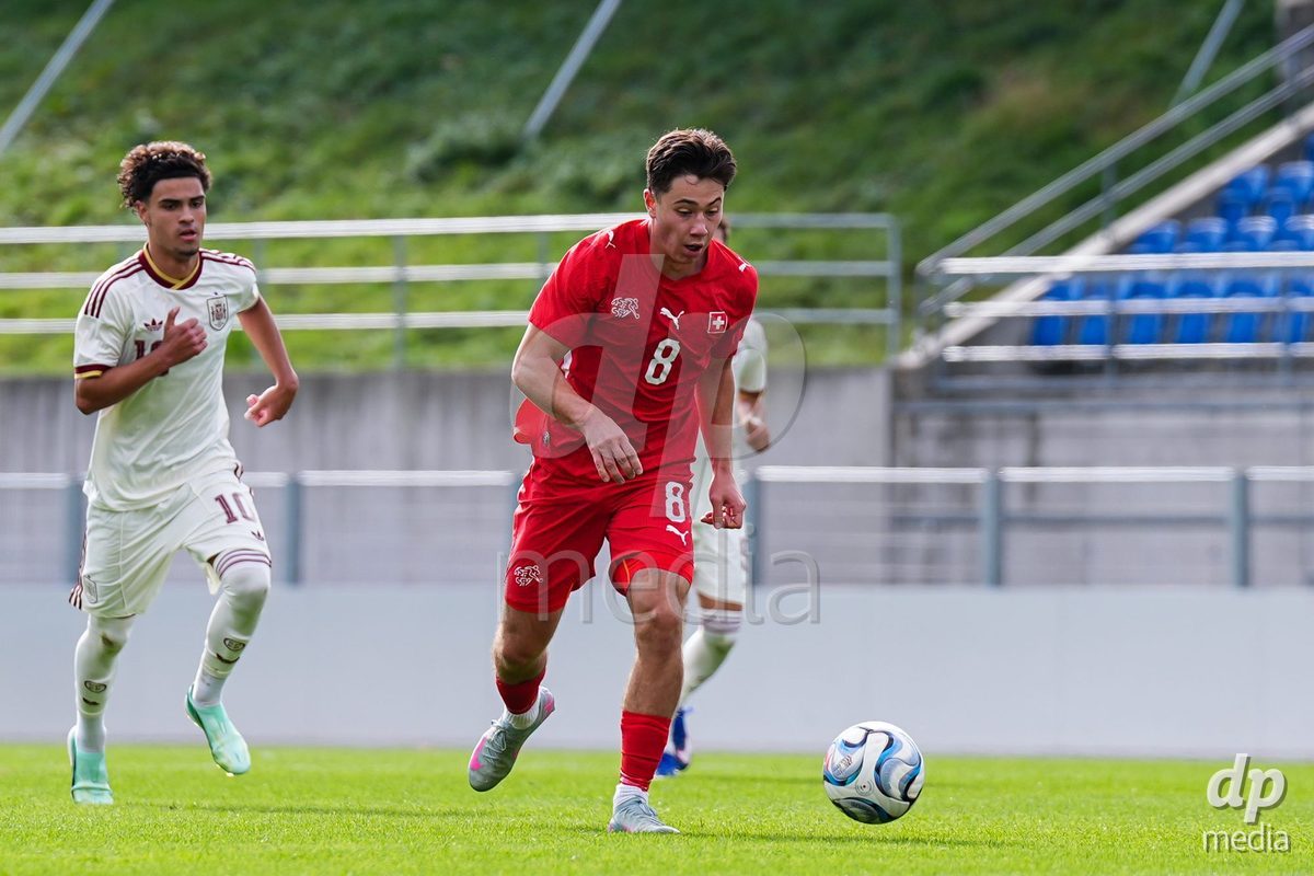 VADUZ, LIECHTENSTEIN - OCTOBER 18: Leandro Cottiati of Switzerland shoots the ball during the UEFA European Under-17 Qualifier match between Switzerland and Spain at Rheinpark Stadion on October 18, 2026 in Vaduz, Liechtenstein.