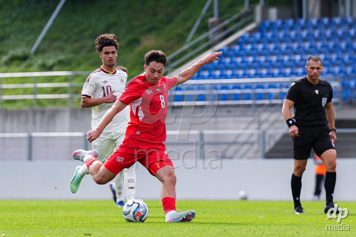 VADUZ, LIECHTENSTEIN - OCTOBER 18: Leandro Cottiati of Switzerland shoots the ball during the UEFA European Under-17 Qualifier match between Switzerland and Spain at Rheinpark Stadion on October 18, 2026 in Vaduz, Liechtenstein.