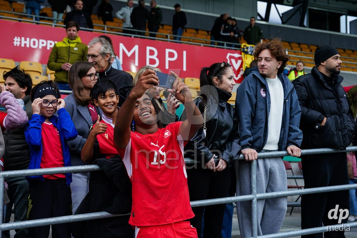 VADUZ, LIECHTENSTEIN - OCTOBER 18: Leon White of Switzerland with fans during the UEFA European Under-17 Qualifier match between Switzerland and Spain at Rheinpark Stadion on October 18, 2026 in Vaduz, Liechtenstein.