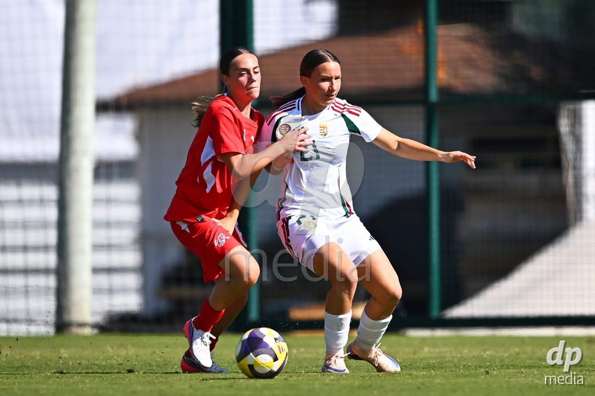 OLIVA NOVA, SPAIN - OCTOBER 22: Amelie Zorgiebel of Switzerland competes for the ball with Melinda Sallai of Hungary during the International Women's Friendly match between Hungary U17 and Switzerland U17 at Oliva Nova Sports Center on October 22, 2026 in Oliva Nova, Spain.