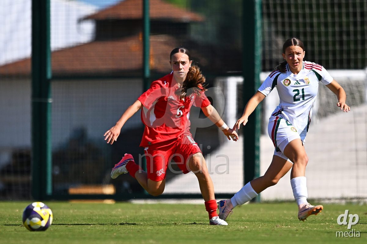 OLIVA NOVA, SPAIN - OCTOBER 22: Amelie Zorgiebel of Switzerland competes for the ball with Melinda Sallai of Hungary during the International Women's Friendly match between Hungary U17 and Switzerland U17 at Oliva Nova Sports Center on October 22, 2026 in Oliva Nova, Spain.