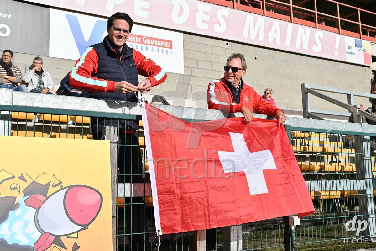 MOUSCRON, BELGIUM - OCTOBER 22: fans and supporters of Switzerland deploy their Swiss flag  during the International Women's Friendly match between Belgium U16 and Switzerland U16 at Le Cannonier on October 22, 2026 in Mouscron, Belgium.
