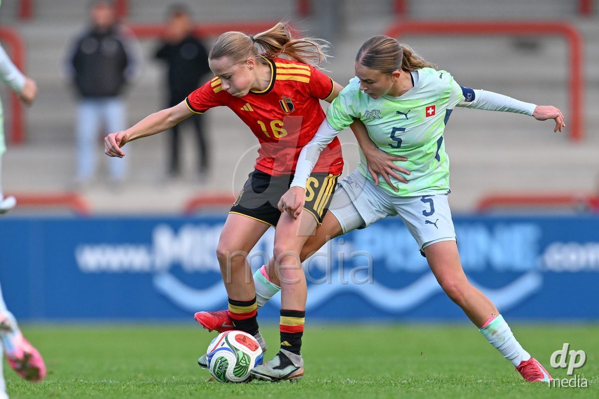 MOUSCRON, BELGIUM - OCTOBER 22: Elise Baert (16) of Belgium fighting for the ball with Sophie Augustin (5) of Switzerland  during the International Women's Friendly match between Belgium U16 and Switzerland U16 at Le Cannonier on October 22, 2026 in Mouscron, Belgium.
