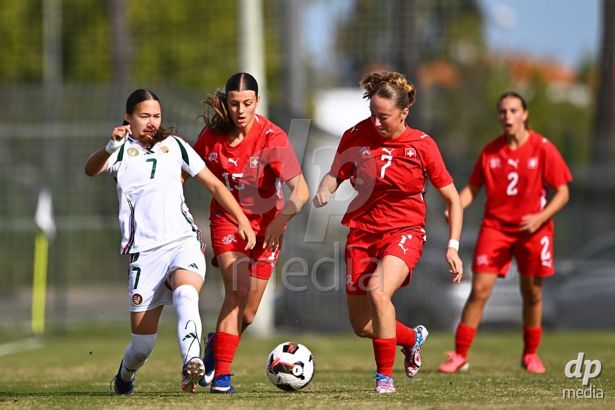 OLIVA NOVA, SPAIN - OCTOBER 24: Lara Toro of Hungary competes for the ball with Yael Kobler of Switzerland during the International Women's Friendly match between Switzerland U17 and Hungary U17 at Oliva Nova Sports Center on October 24, 2026 in Oliva Nova, Spain.