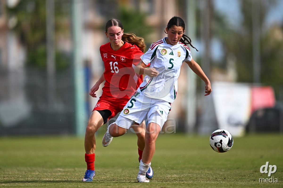 OLIVA NOVA, SPAIN - OCTOBER 24: Elynn Raymond of Switzerland competes for the ball with Eszter Juhasz of Hungary during the International Women's Friendly match between Switzerland U17 and Hungary U17 at Oliva Nova Sports Center on October 24, 2026 in Oliva Nova, Spain.