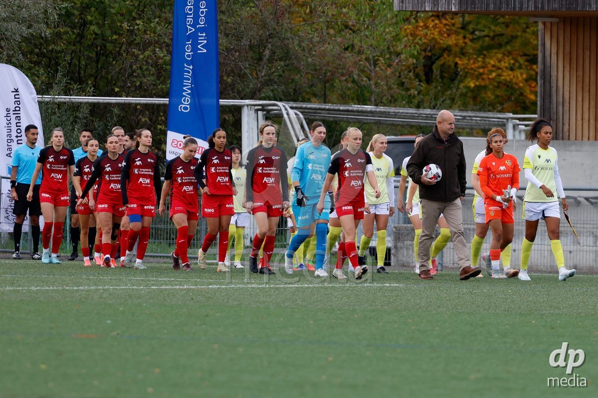 AARAU, SWITZERLAND - OCTOBER 24: Both teams entering the pitch during the AXA Women's Cup match between FC Aarau Frauen and FC Basel 1893 at Sportanlage Schachen on October 24, 2026 in Aarau, Switzerland.