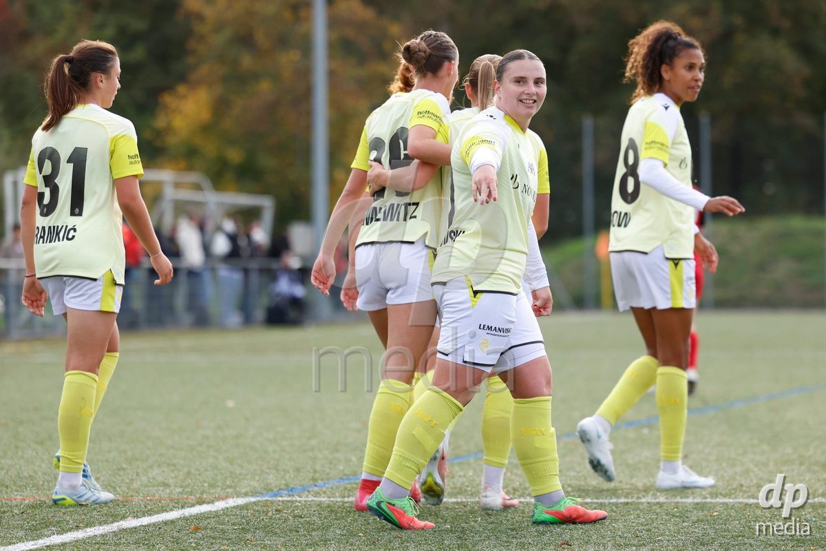 AARAU, SWITZERLAND - OCTOBER 24: Julia Matuschewski of FC Basel 1893 celebrating with Team of FC Basel 1893 after scoring the second goal during the AXA Women's Cup match between FC Aarau Frauen and FC Basel 1893 at Sportanlage Schachen on October 24, 2026 in Aarau, Switzerland.