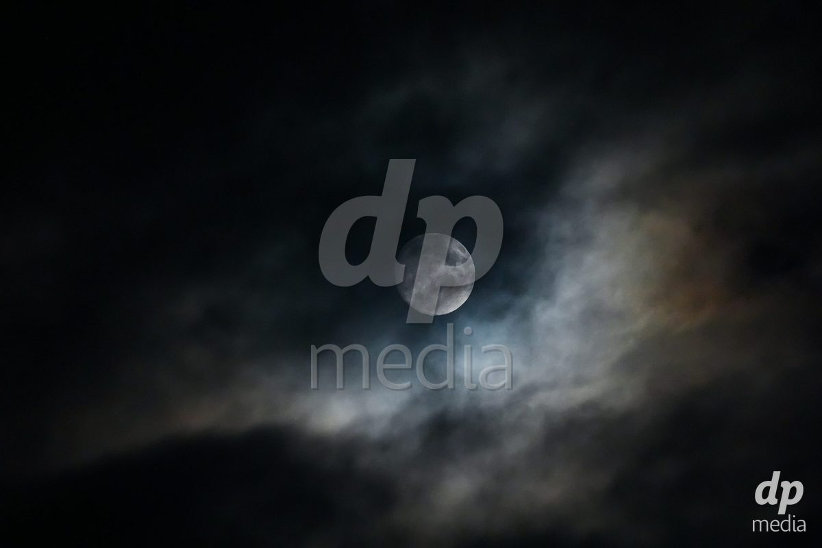 WIL, SWITZERLAND - OCTOBER 24: Full moon behind some clouds during the AXA Women's Cup match between FC Wil 1900 and Servette FC Chenois Feminin at Lidl Sportpark on October 24, 2026 in Wil, Switzerland.