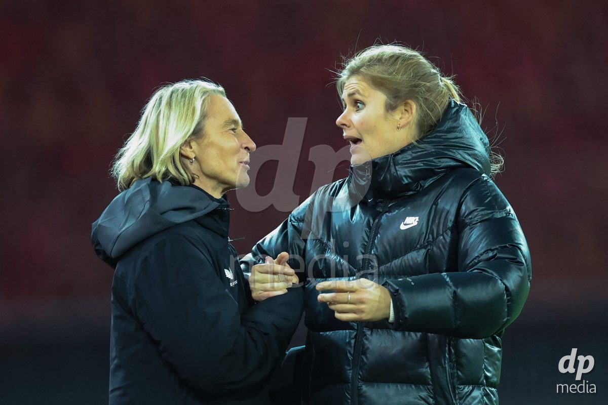 ZURICH, SWITZERLAND - OCTOBER 24: Martina Voss-Tecklenburg (Head Coach, FC Zürich Frauen) (L) congratulated on advancing to the next round of the cup Imke Wübbenhorst (Head Coach, BSC YB Frauen) during the AXA Women's Cup match between FC Zurich and BSC YB Frauen at Letzigrund on October 24, 2026 in Zurich, Switzerland.