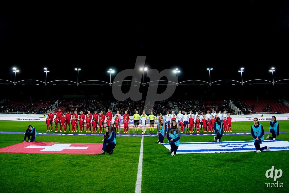 SION, SWITZERLAND - OCTOBER 13: Players of Switzerland and Players of Israel during the national anthems during the FIFA Women´s World Cup European Qualifiers match between Switzerland and Israel at Stade de Tourbillon on October 13, 2026 in Sion, Switzerland.