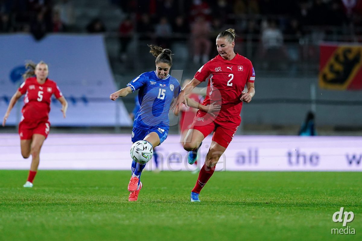 SION, SWITZERLAND - OCTOBER 13: Julia Stierli of Switzerland and Vital Kats of Israel battle for the ball during the FIFA Women´s World Cup European Qualifiers match between Switzerland and Israel at Stade de Tourbillon on October 13, 2026 in Sion, Switzerland.