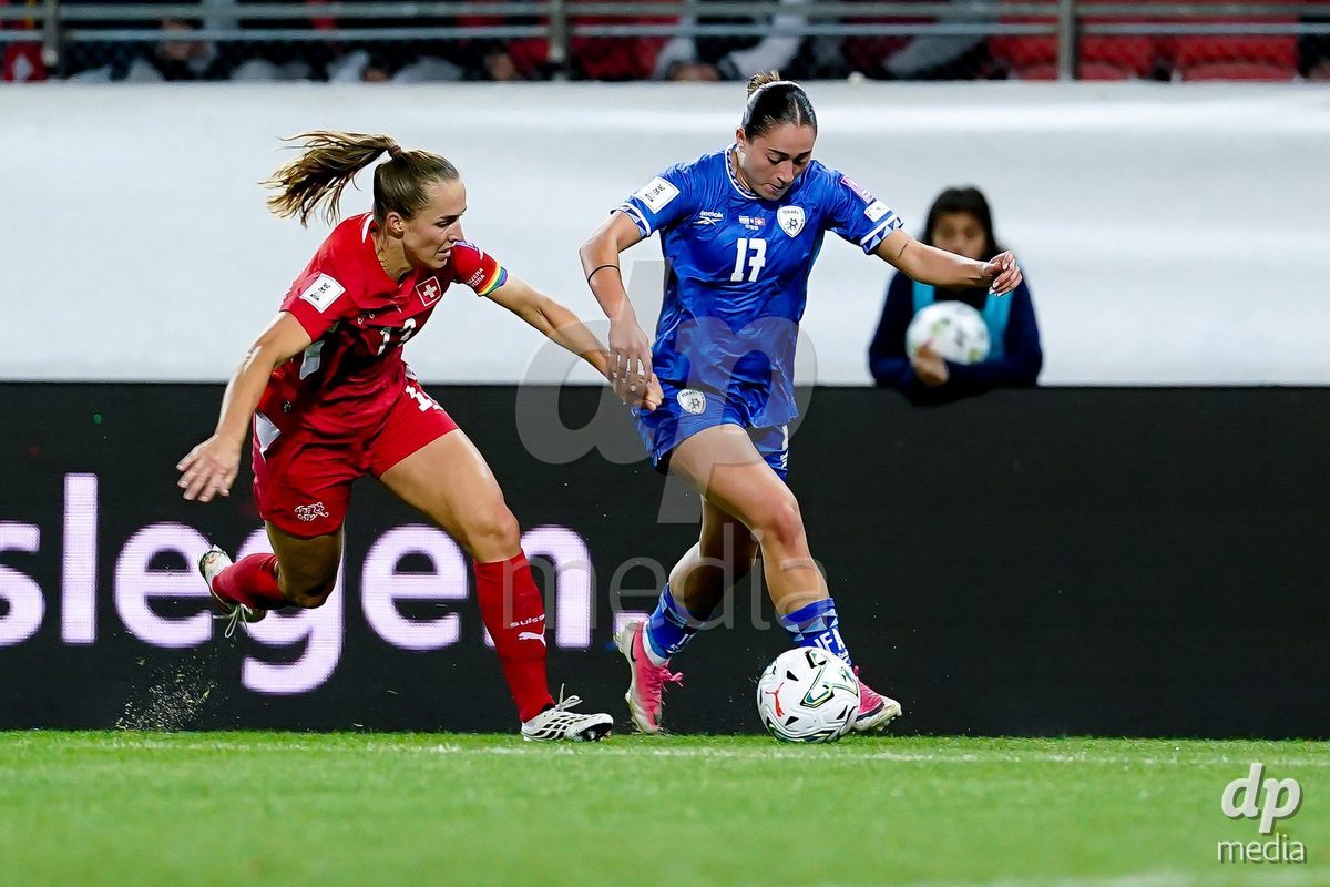 SION, SWITZERLAND - OCTOBER 13: Smadar Cohen of Israel and Lia Walti of Switzerland battle for the ball during the FIFA Women´s World Cup European Qualifiers match between Switzerland and Israel at Stade de Tourbillon on October 13, 2026 in Sion, Switzerland.