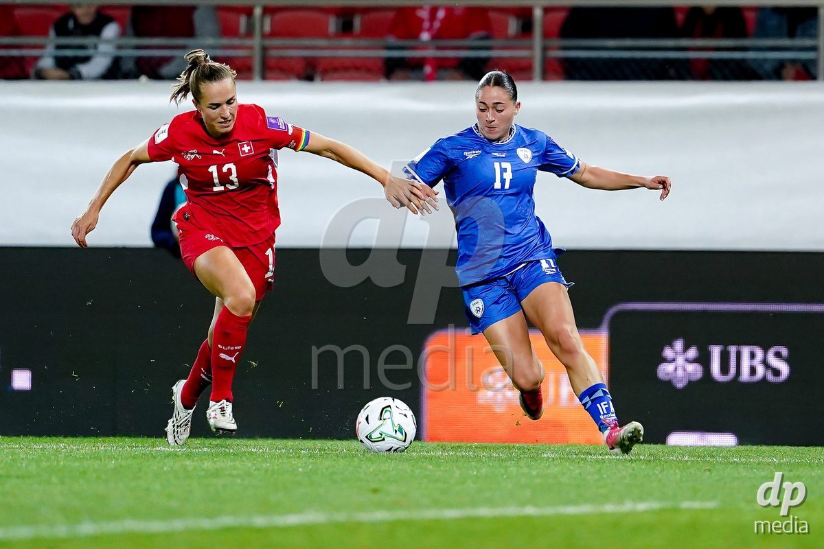 SION, SWITZERLAND - OCTOBER 13: Smadar Cohen of Israel and Lia Walti of Switzerland battle for the ball during the FIFA Women´s World Cup European Qualifiers match between Switzerland and Israel at Stade de Tourbillon on October 13, 2026 in Sion, Switzerland.