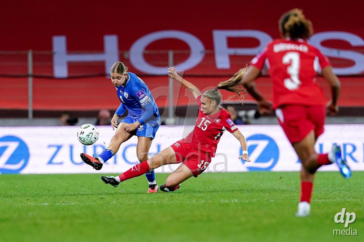 SION, SWITZERLAND - OCTOBER 13: Alena Bienz of Switzerland and Tamar Lipsicas Geva of Israel battle for the ball during the FIFA Women´s World Cup European Qualifiers match between Switzerland and Israel at Stade de Tourbillon on October 13, 2026 in Sion, Switzerland.