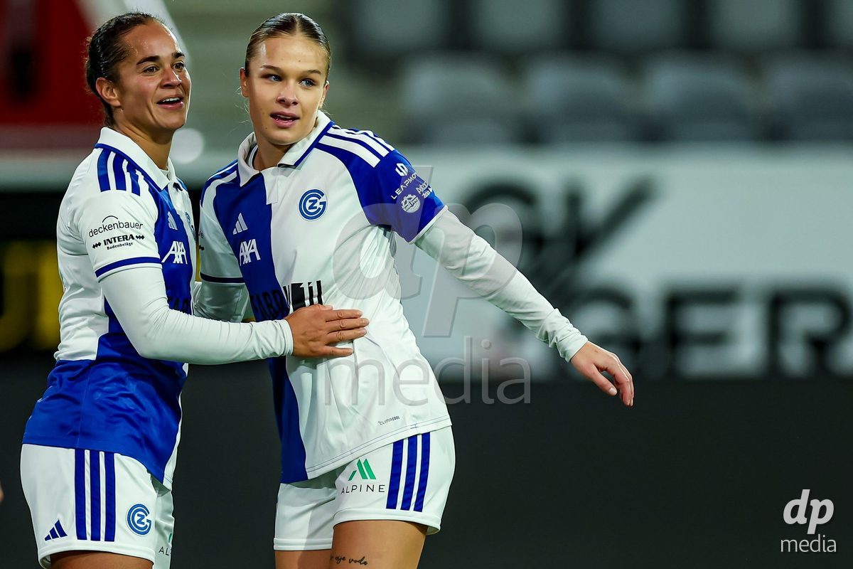 THUN, SWITZERLAND - OCTOBER 25: Kayla McKenna Frauenfussball (L) and Ella Ljustina of GC Frauenfussball celebrate a goal during the AXA Women's Cup match between FC Thun and GC Frauenfussball at Visana Stadion on October 25, 2026 in Thun, Switzerland.