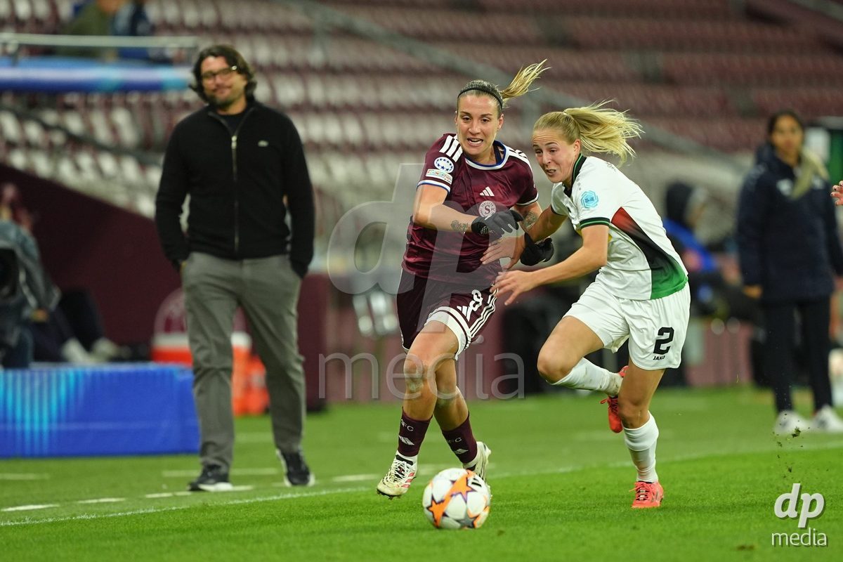 GENEVA, SWITZERLAND - OCTOBER 28: Gloria Marinelli of Servette FC Chenois Feminin against Saar Janssen of OH Leuven during the UEFA Women's Champions League match between Servette FC Chenois Feminin and OH Leuven at Stade de Geneve on October 28, 2026 in Geneva, Switzerland.